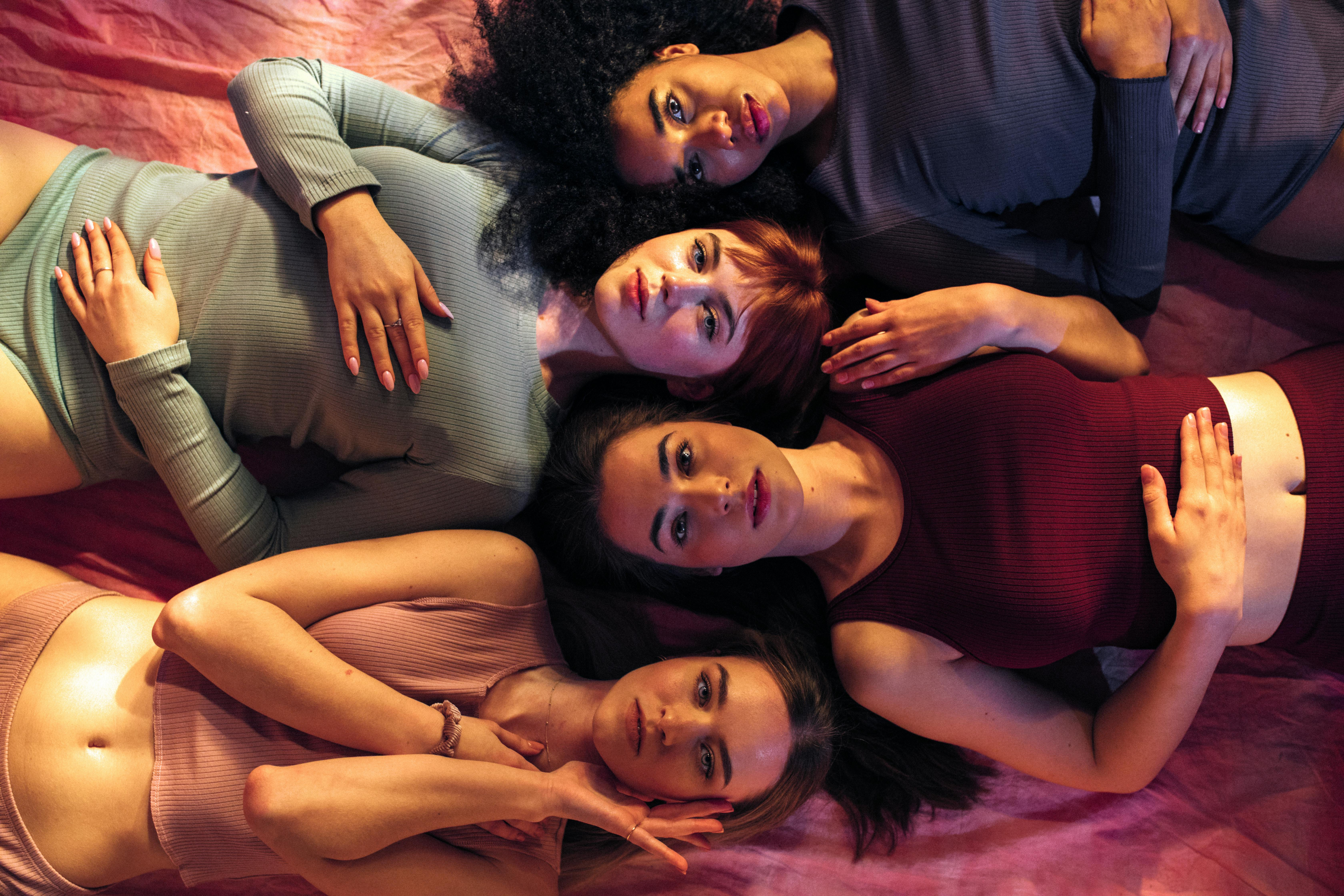 Women in a shared moment of healing